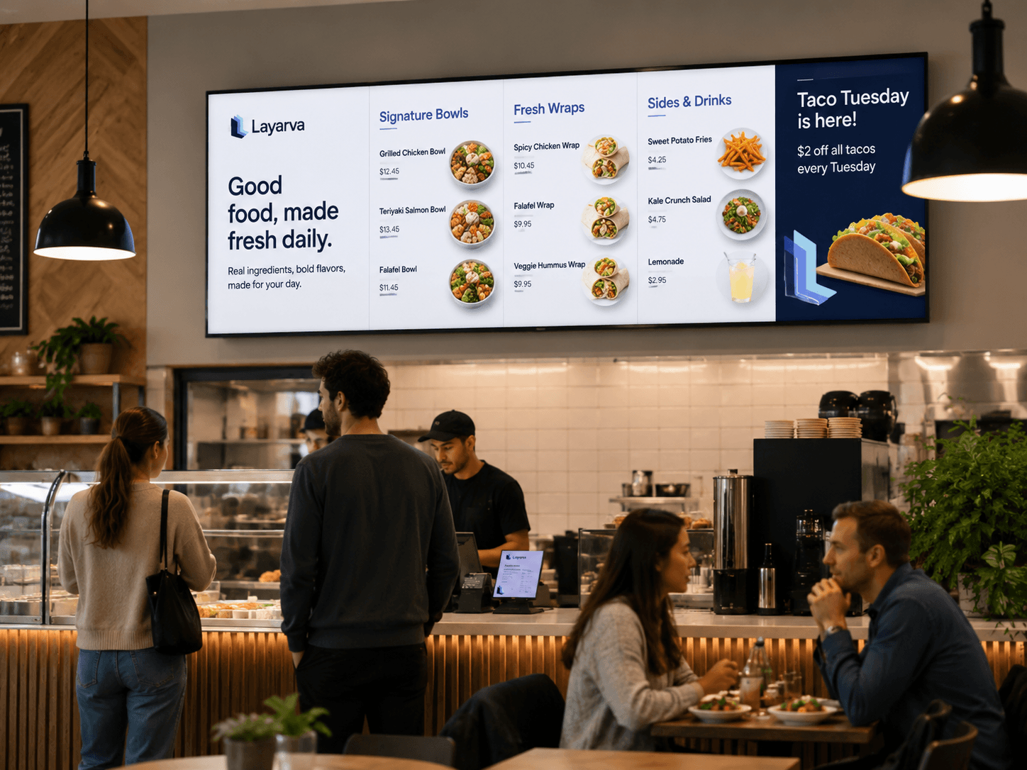 Restaurant digital menu board showing food items and daily promotions